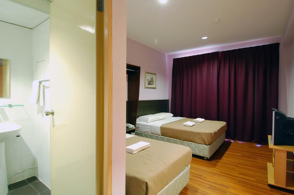 Aristo Hotel Putatan Kota Kinabalu Phòng bức ảnh